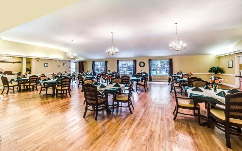 a large room with tables and chairs